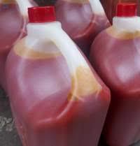 Product image - IT IS A QUALITY  RED OIL FOR HUMAN CONSUMPTION AND FOR SOAP PRODUCTION